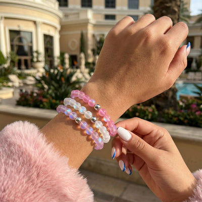 NOGU Made to Pair Pink Mermaid Glass bracelets layered in luminous pink and pearly white beads with silver accents.
