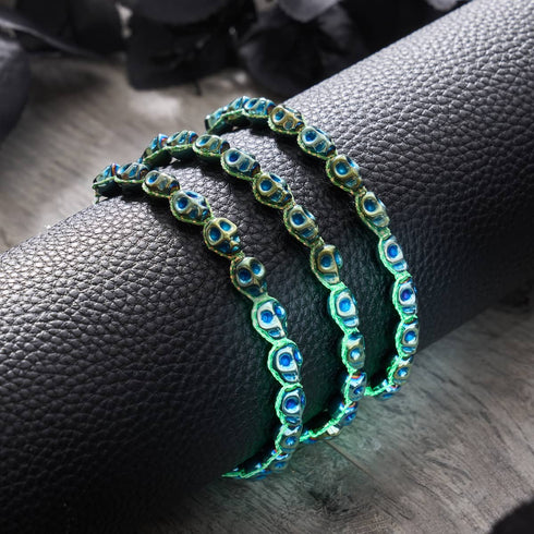 Phantom Tides | Blaugrüne Totenköpfe x Blaugrünes GloWeave | Makramee-Armband