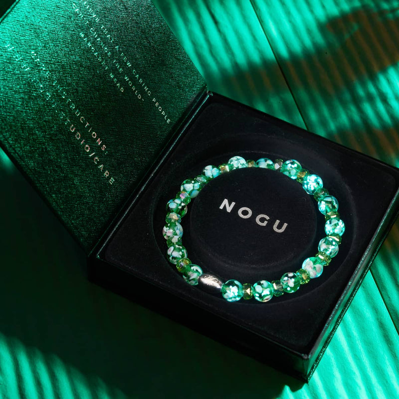 Grüne Orchidee | 925er Sterlingsilber | Glühwürmchen-Glasblütenarmband