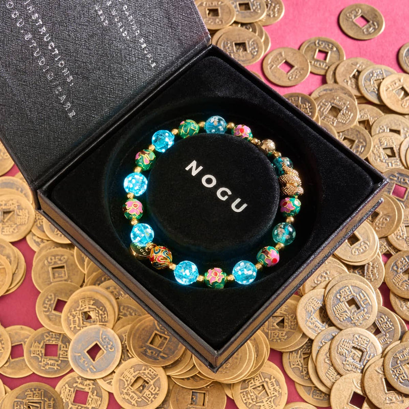 Seedrache | Emaillierter Lotus | Blaugrünes Glühwürmchen-Glasschlangenarmband