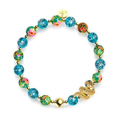 Sea Dragon bracelet with teal firefly glass beads, enamel lotus designs, 18k gold serpent charm, and stainless steel by NOGU