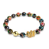 Schattendrache | Emaille-Lotus | Onyx-Glühwürmchen-Glas-Schlangenarmband