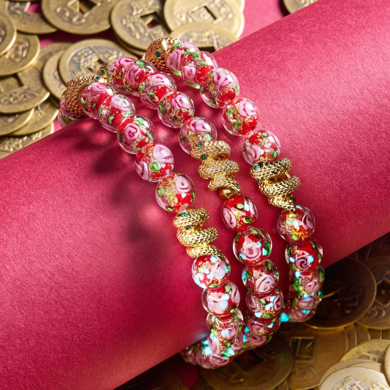 Goldene Schlange | Feuerwerk Glas Rose Armband