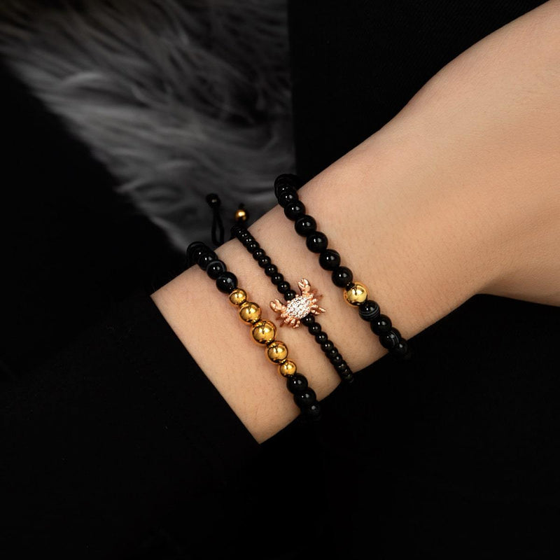 Kristall-Seekrabbe | 18 Karat Roségold & Rotguss | Schwarz | Makramee-Charmballa-Armband