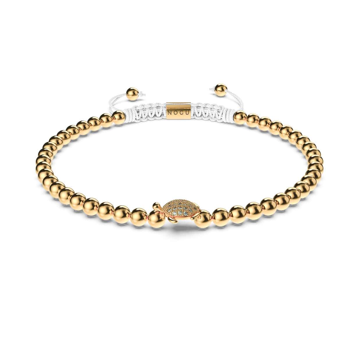 Tortuga | 18 Karat Gold | Weiß | Meeresschildkröte aus Kristall | Makramee-Charmballa-Armband