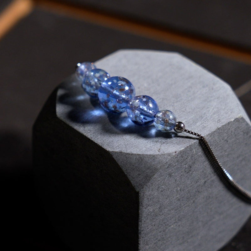 Indigo | 925er Sterlingsilber | Halskette mit Glühwürmchen-Glas-Unendlichkeitsverschluss