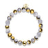 Armband aus goldfarbenem Chrom und weißem Glitzerglas