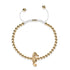 Riff | 18 Karat Gold | Seepferdchen Makramee Charmballa Armband