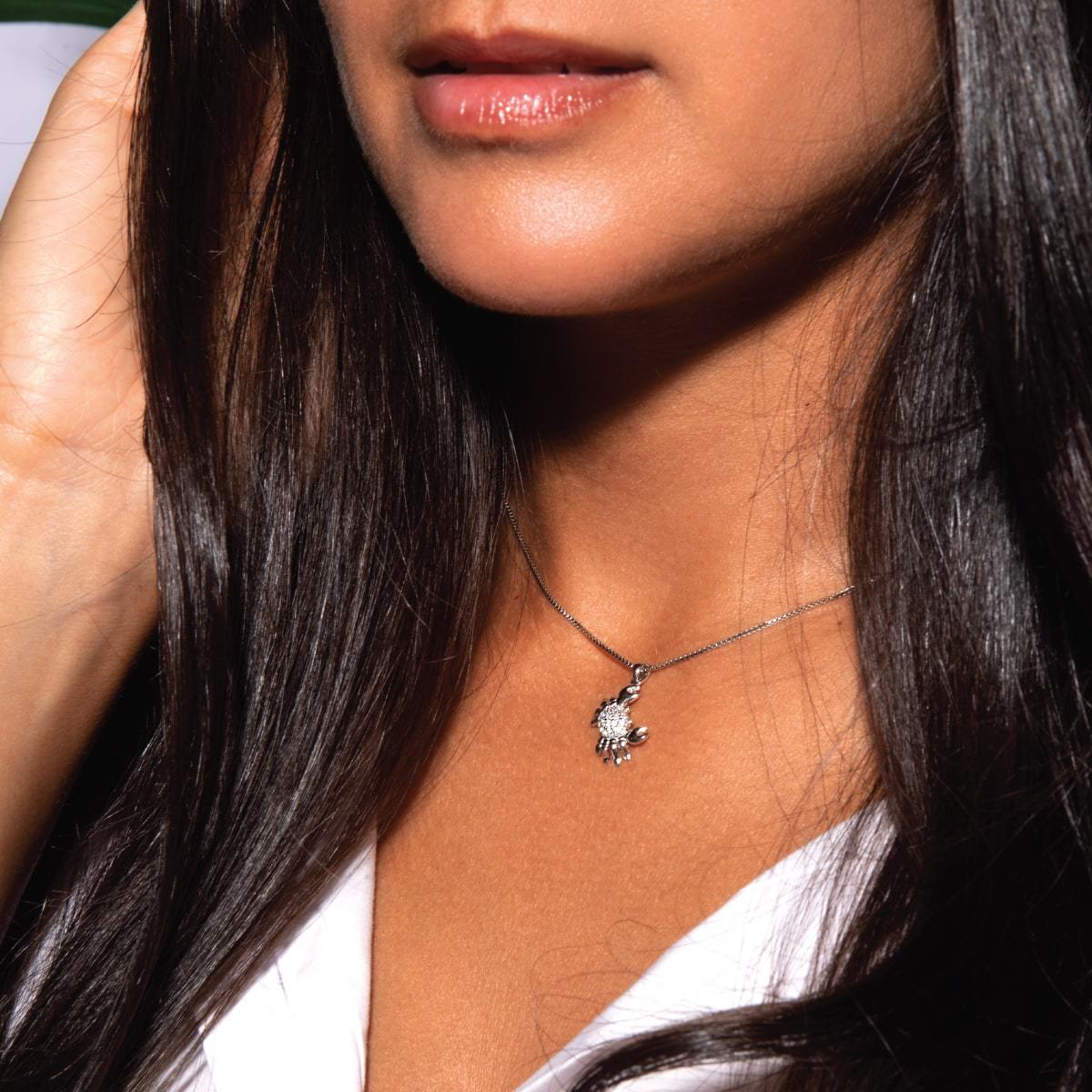 Wendekreis des Krebses | 925er Sterlingsilber | Halskette mit Kristall-Seekrabbe und Unendlichkeitsverschluss