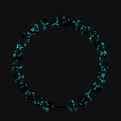 Blue Shamrock Firefly Glass bracelet with glowing green and blue beads and sterling silver bead by NOGU