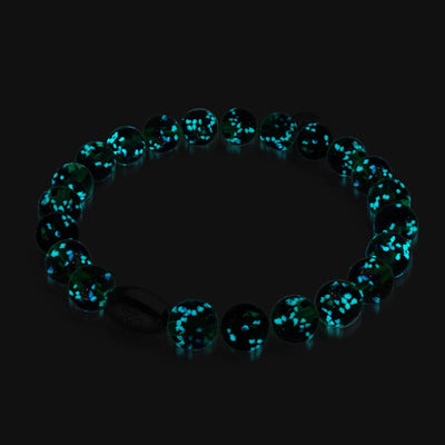 Blue Shamrock bracelet glowing in the dark with turquoise phosphorescent beads and sterling silver accent by NOGU