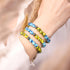 Sonne und Himmel | Ukrainische Hilfe | Glühwürmchen-Glasperlenarmband