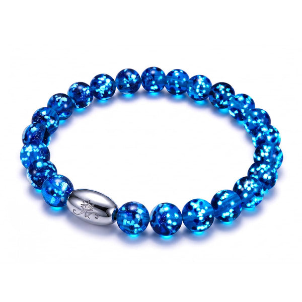 Topaz Flame Firefly Glass bracelet with luminous sapphire-blue lampwork beads and a polished .925 sterling silver clasp.