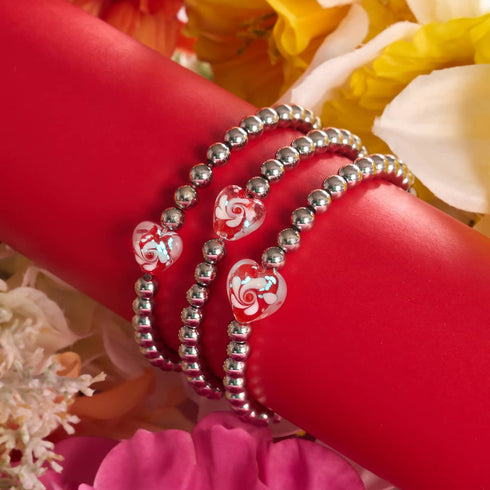 Purpurroter Wirbel | Leuchtendes Herz-Essenz-Armband 