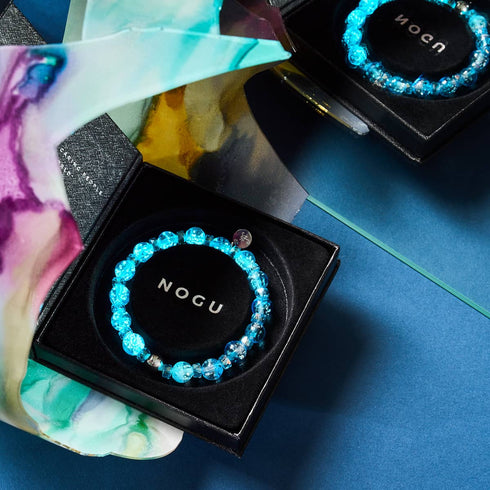 Aquamarin Eis | Firefly Glas Schneekugel Armband