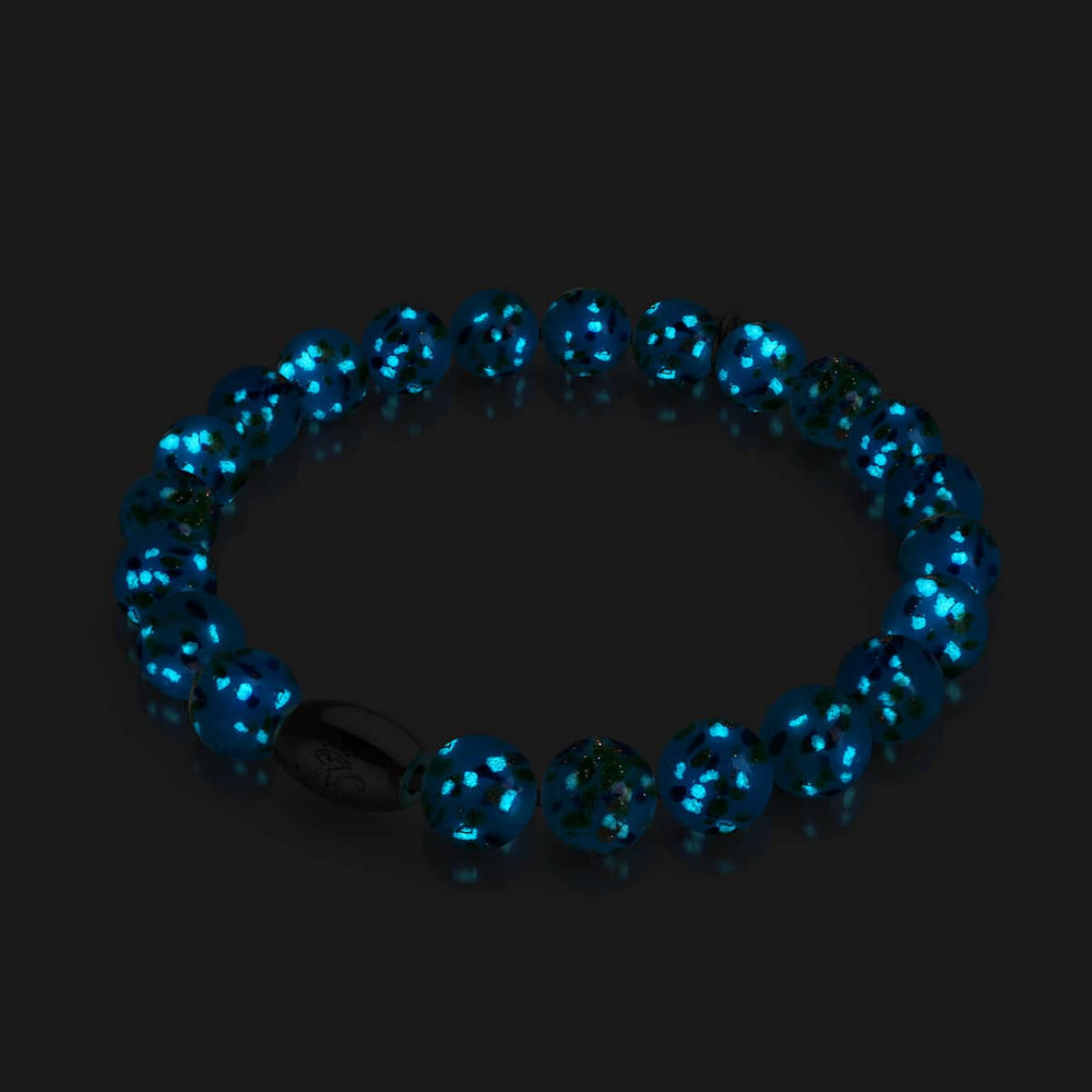 Blue Juniper Firefly Glass Bracelet glowing with sapphire phosphorescent beads and .925 sterling silver clasp by NOGU