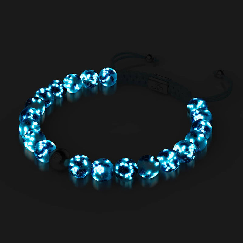 Blue Seaspray Firefly Glass macrame bracelet glowing bright sapphire blue with adjustable stainless steel clasp by NOGU
