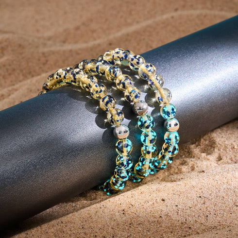 Sandsteinflamme | Silber | Glühwürmchen-Glas-Makramee-Armband