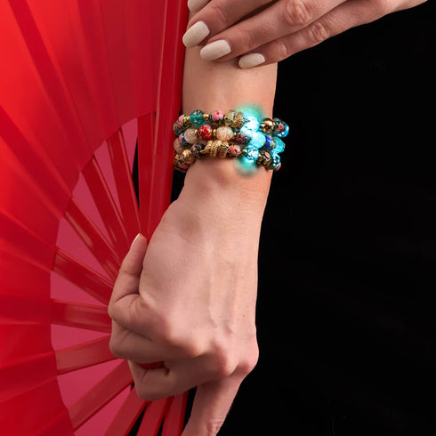 Seedrache | Emaillierter Lotus | Blaugrünes Glühwürmchen-Glasschlangenarmband