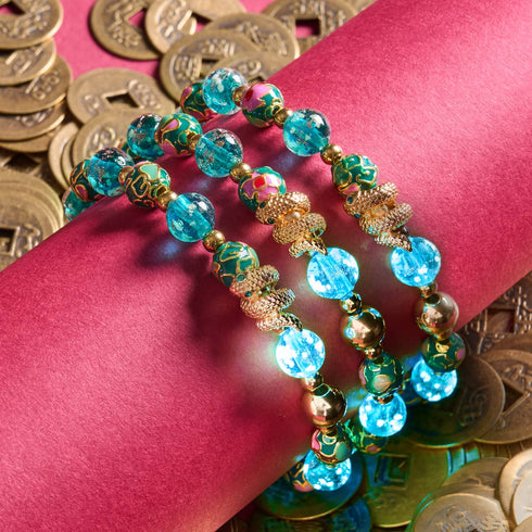 Seedrache | Emaillierter Lotus | Blaugrünes Glühwürmchen-Glasschlangenarmband