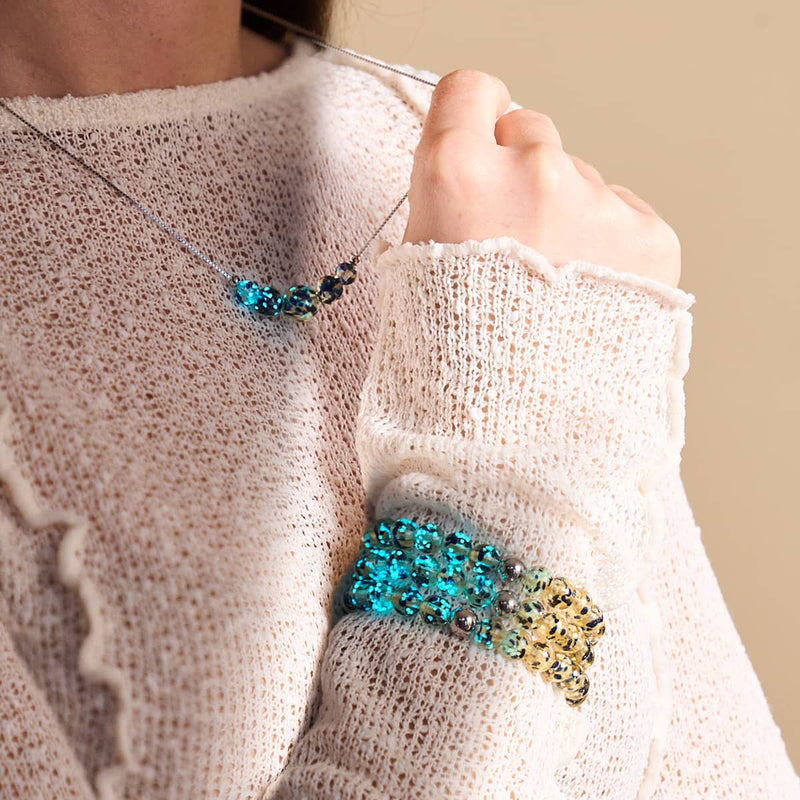 Sandsteinflamme | 925er Sterlingsilber | Glühwürmchen-Glas-Halskette mit Unendlichkeitsverschluss 