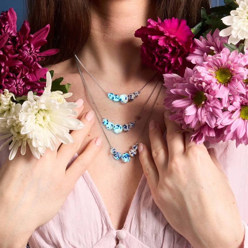 Sternenklare Wellen | 925er Sterlingsilber | Glühwürmchen-Glas-Halskette mit Unendlichkeitsverschluss 