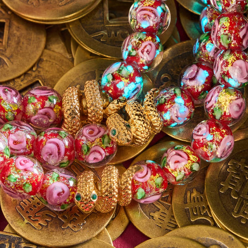 Goldene Schlange | Feuerwerk Glas Rose Armband