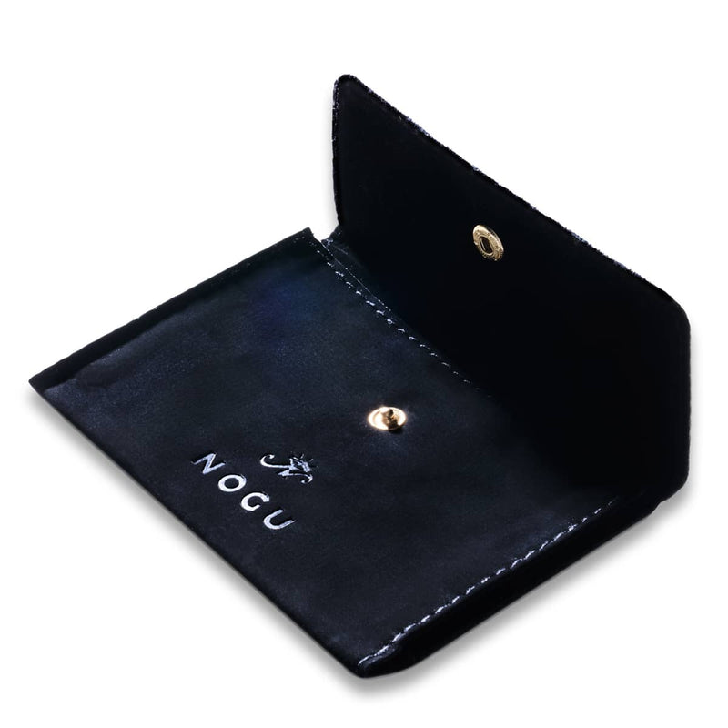 NOGU | Schwarze Reise-Clutch aus Mikro-Wildleder